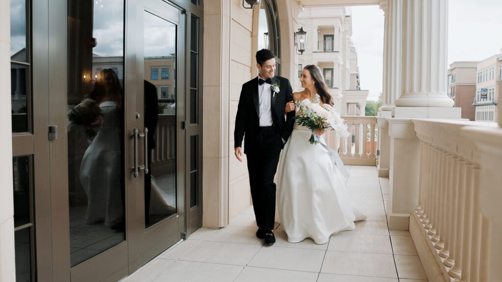 Bride and groom on the terrace of Hotel Carmichael