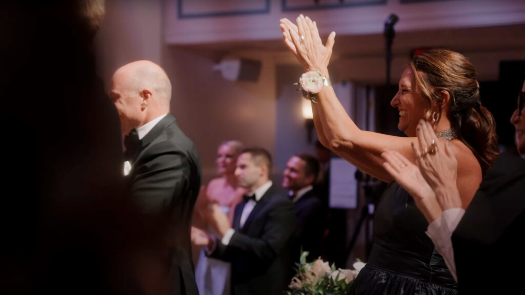 Guests cheering inside The Palladium Center for the Performing Arts